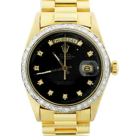 black face rolex 18k gold.